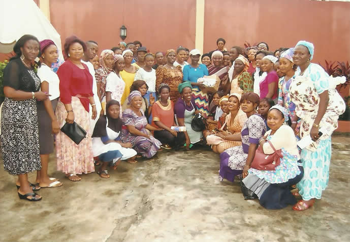 Trainees at a graduation with their certificates
